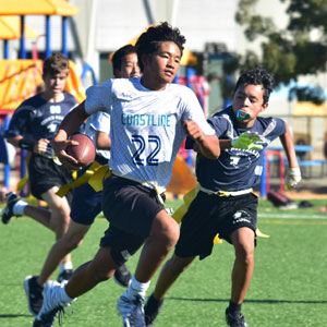 Student Running With Football